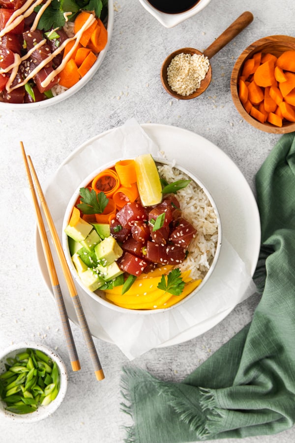 Tuna Poke Bowl topped with pickled vegetables.