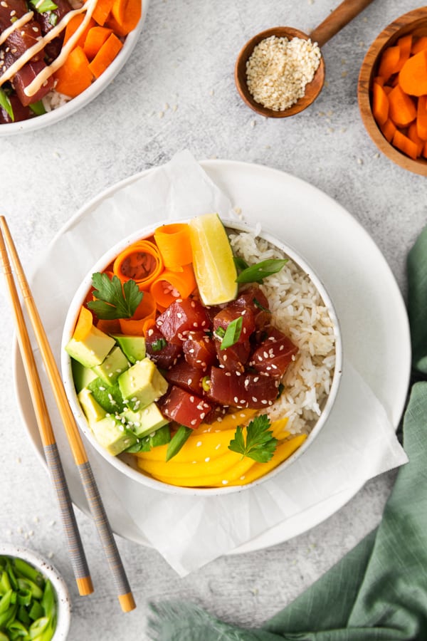 Tuna Poke Bowl served with chopsticks.