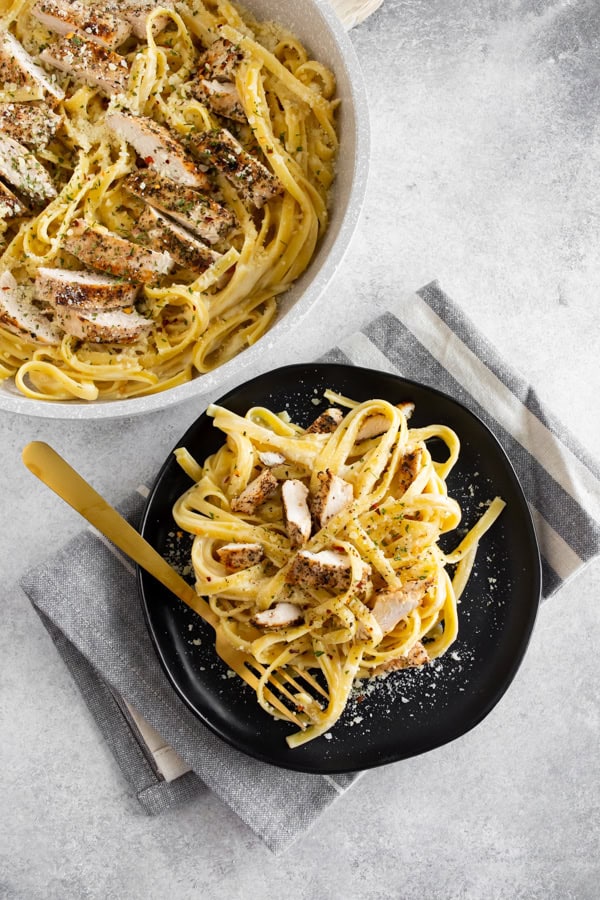 Chicken Fettuccine Alfredo served on a plate.