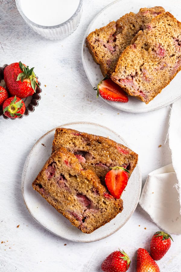 Fresh Strawberry Bread sliced on a plate.