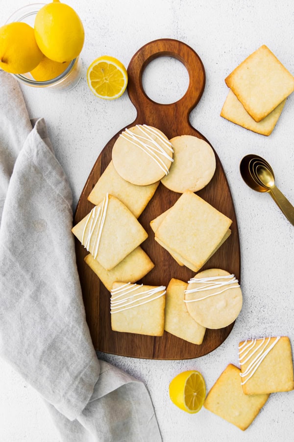 Lemon Shortbread Cookies on a wooden board.