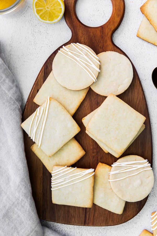 Lemon Shortbread Cookies on a wooden board.