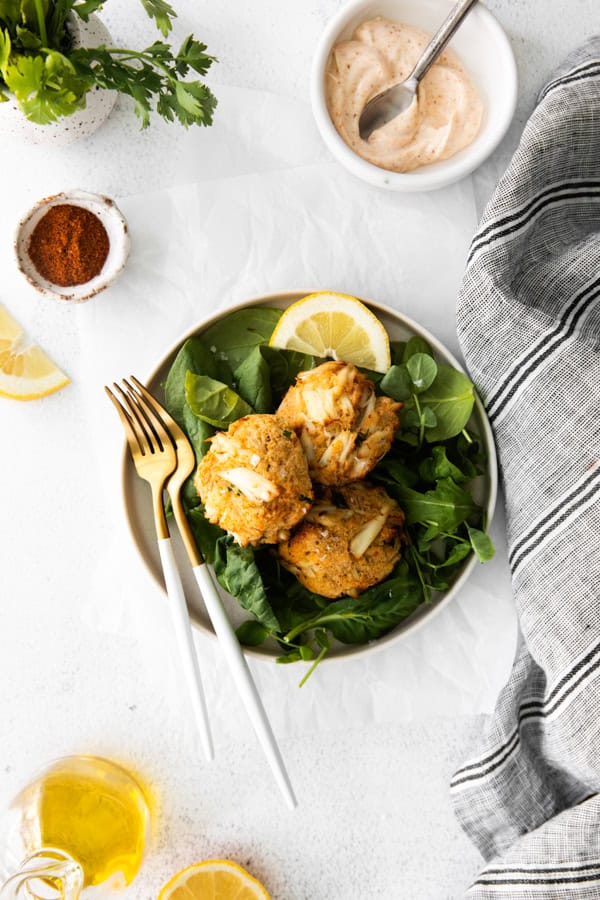 Air Fryer Crab Cakes served on a plate with a fork.