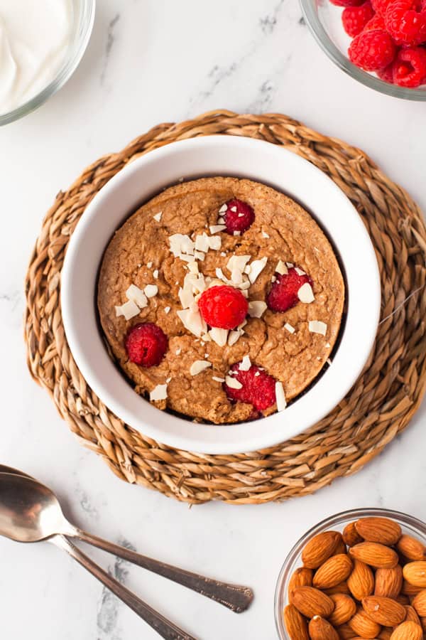 Baked Raspberry Oatmeal topped with almonds.