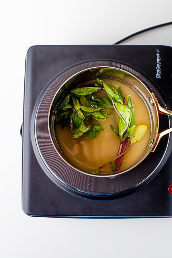 Mint Simple Syrup in a pot.