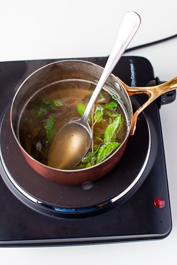 Cooked Mint Simple Syrup in a pan.