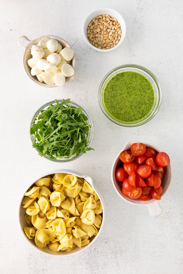 Ingredients to make Pesto Tortellini Salad.