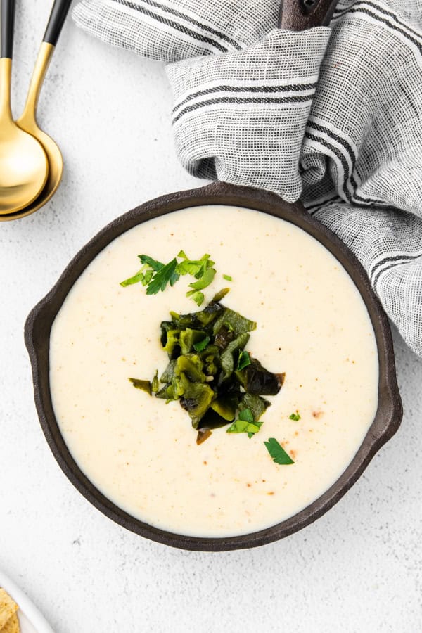 Roasted Poblano Queso served in a skillet. 