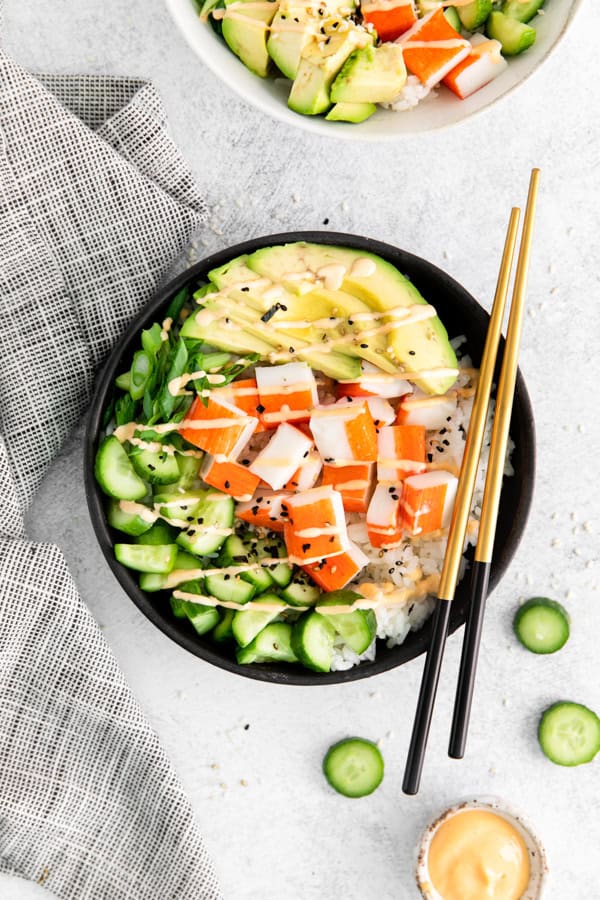 California Roll Sushi Bowl served with chopsticks.