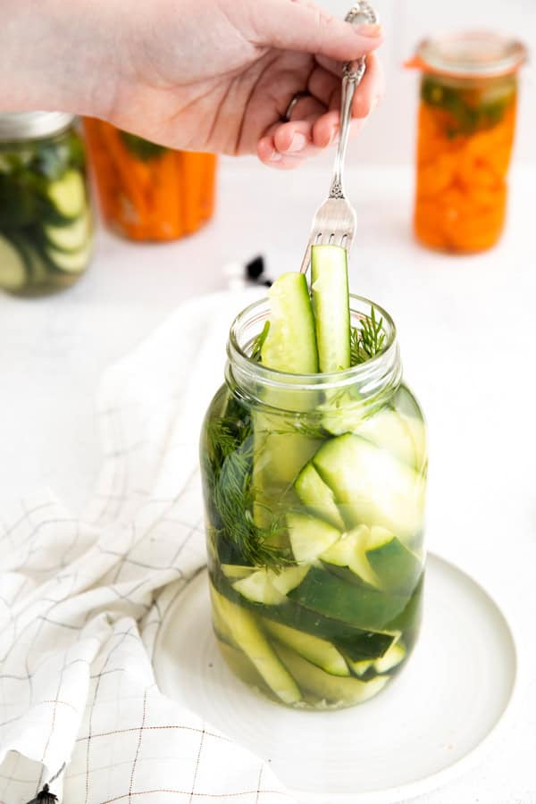 A fork getting a Easy Refrigerator Pickle out of a jar. 