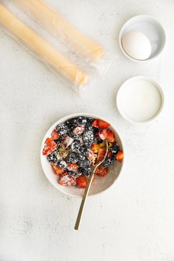 Ingredients for Mini Berry Galettes on a table. 
