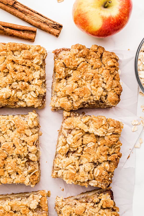 Apple Pie Bars cut and served on a table.