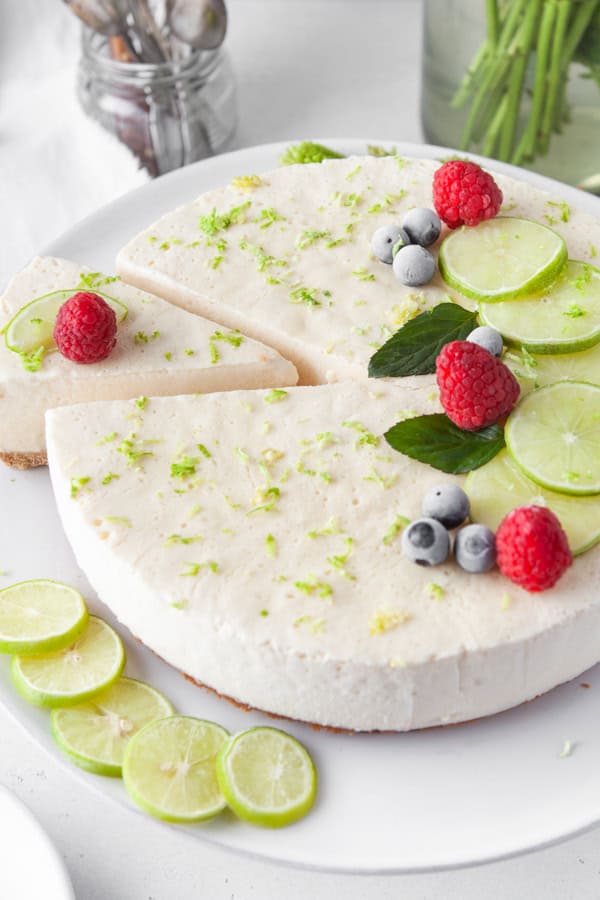 Frozen Lime Pie topped with frozen berries. 