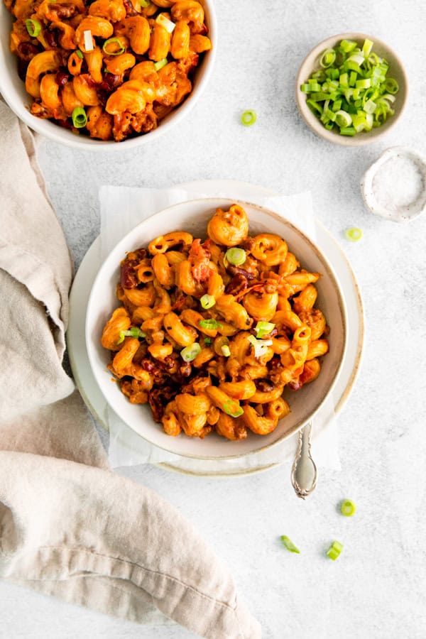 Instant Pot Chili mac in a bowl with a fork. 