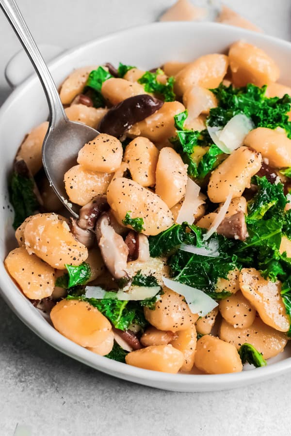 One Pot Mushroom Gnocchi served with parmesan cheese. 