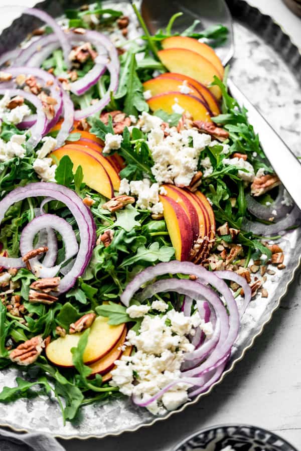 Peach Feta Salad on a large salad tray. 