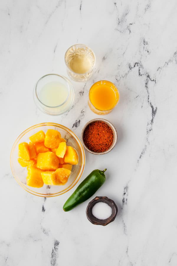 Ingredients to make Jalapeno Mango Margarita. 