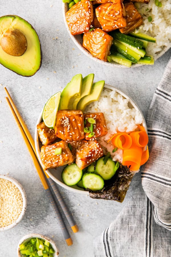 Teriyaki Salmon Bowl served with chopsticks.