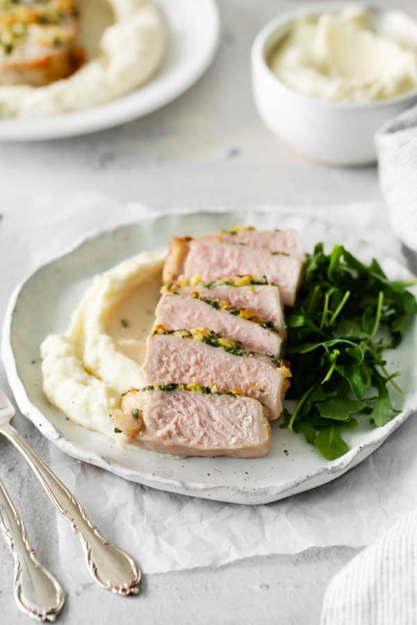 Air Fryer Pork Chops on a white plate. 