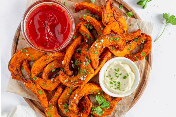 Air Fryer Pumpkin Fries garnished with parsley. 