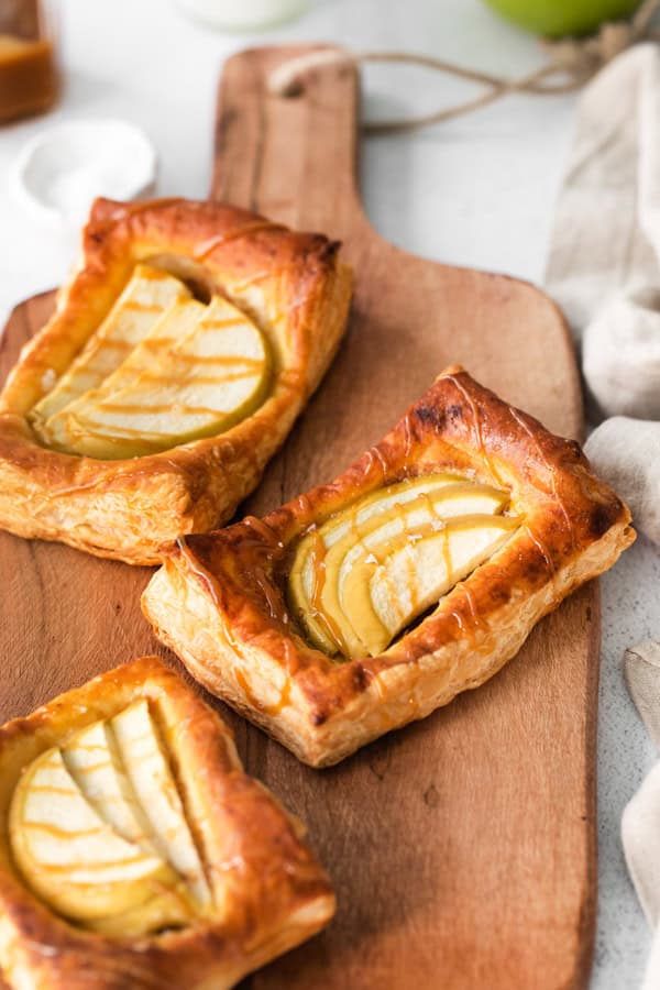Apple Danish drizzled with caramel.