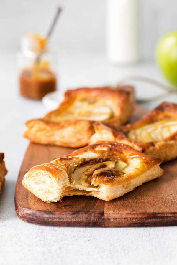 Caramel Apple Danish with a bite taken out of it.