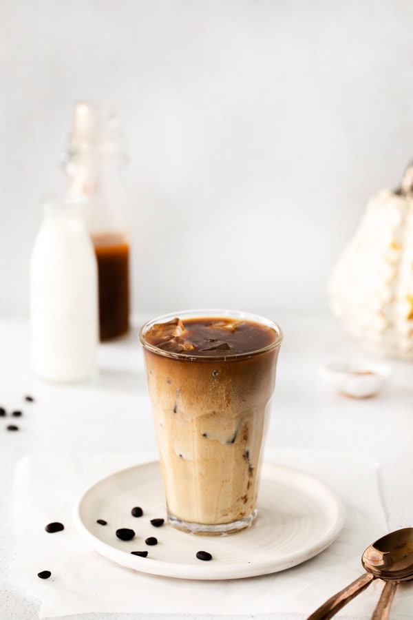 Iced Pumpkin Chai Latte served in a glass.