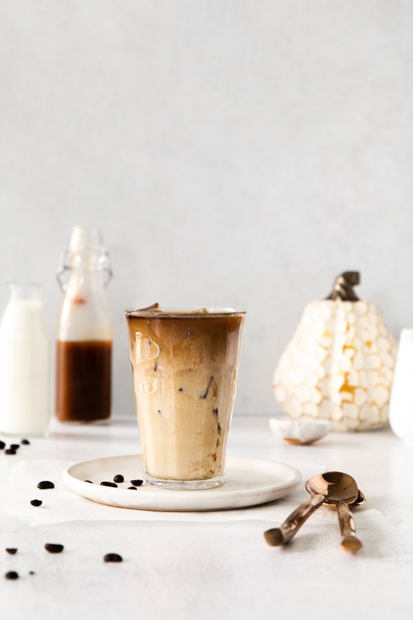 Iced Pumpkin Chai Latte served with milk.