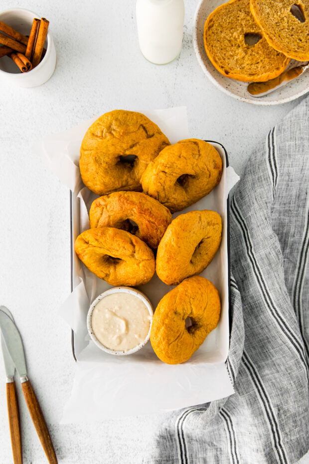 Homemade Pumpkin Bagels in a tray.