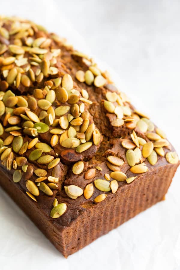 Copycat Starbucks Pumpkin Bread topped with pumpkin seeds.