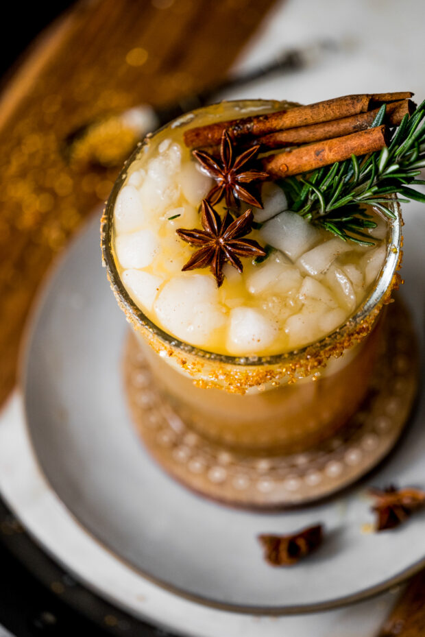 Honeycrisp Apple Sangria garnished with whole spices.