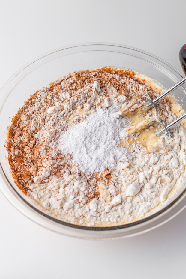 Mixing together the Sweet Pumpkin Cornbread Muffin batter. 