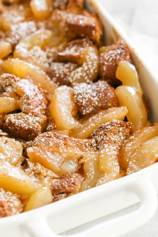Apple Pie Baked French Toast topped with powdered sugar. 