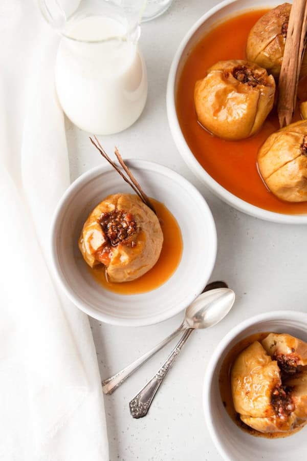 Cinnamon Baked Apples plated in to small bowls. 