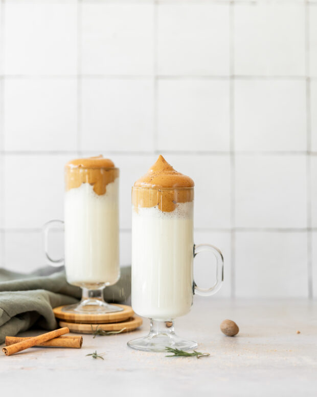 Eggnog Whipped Coffee in a glass mug. 