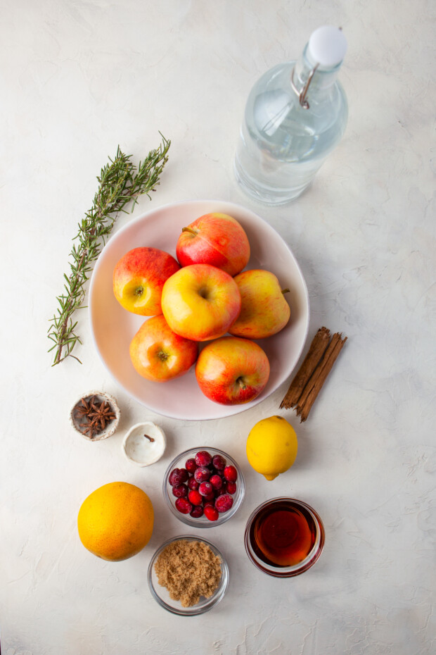 Ingredients to make Instant Pot Apple Cider on a table. 