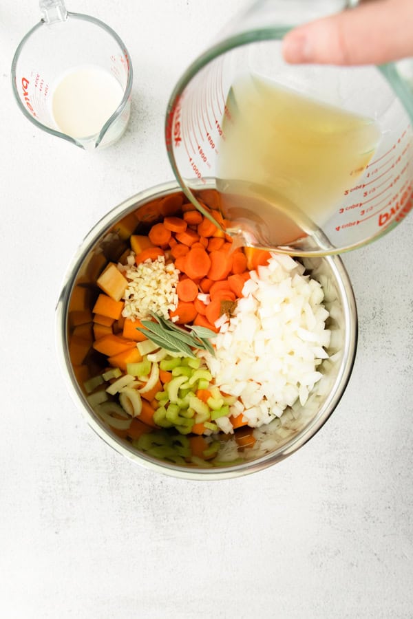 Instant Pot Butternut Squash Soup ingredients in a instant pot container. 