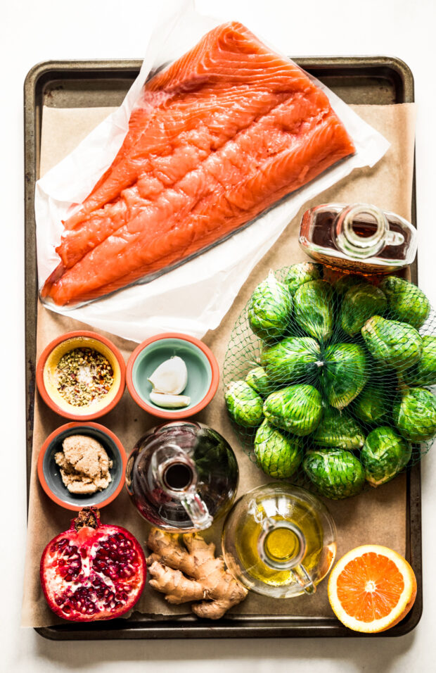 Ingredients to make Marinated Sheet Pan Salmon on a table. 