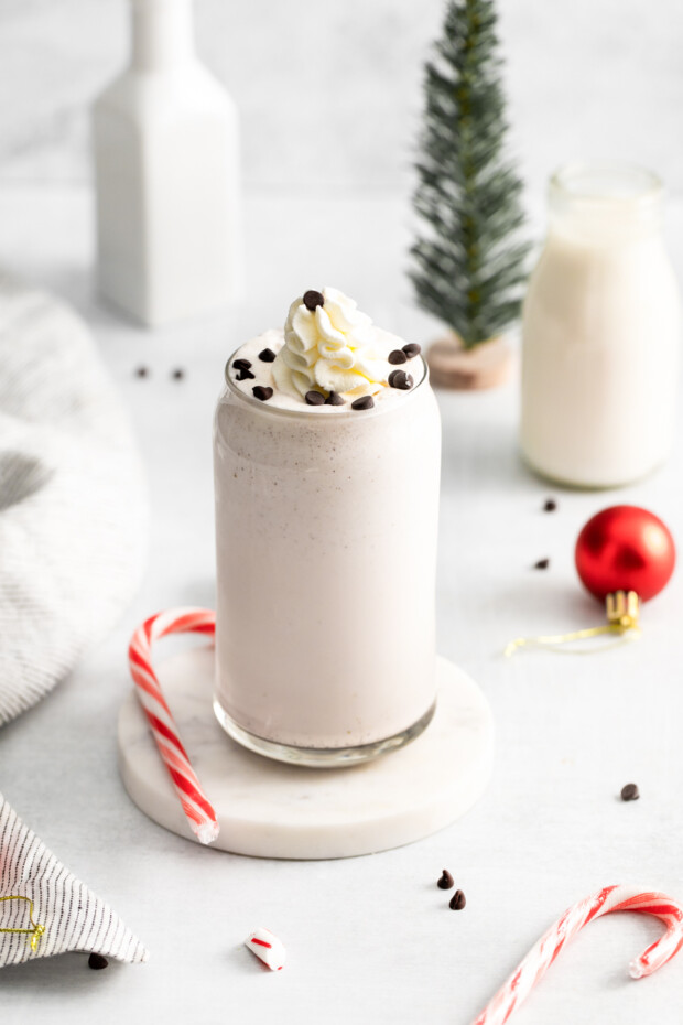Peppermint Bark Milkshake sitting on a coaster.