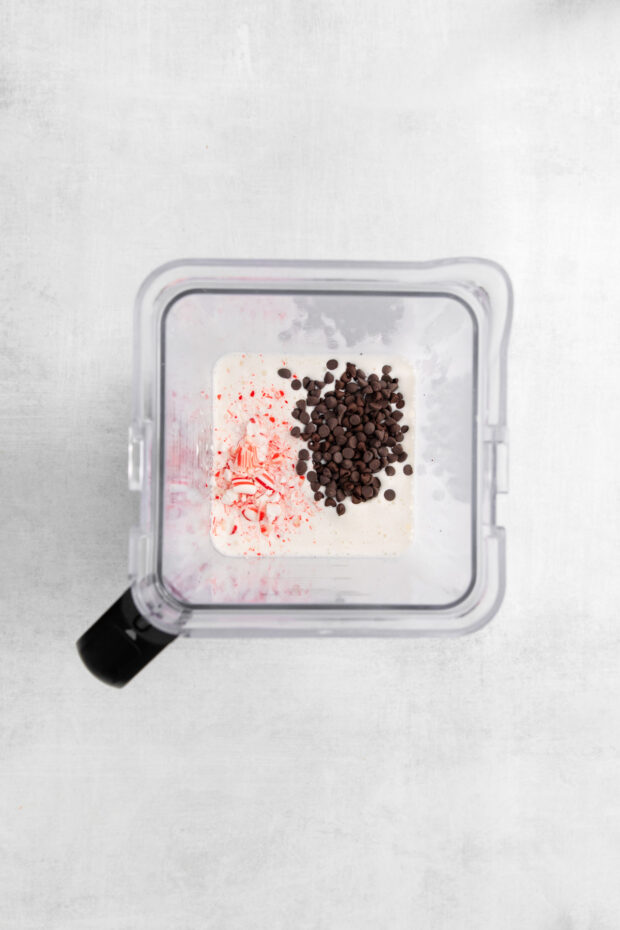 Chocolate chips and candy canes in a blender with ice cream.