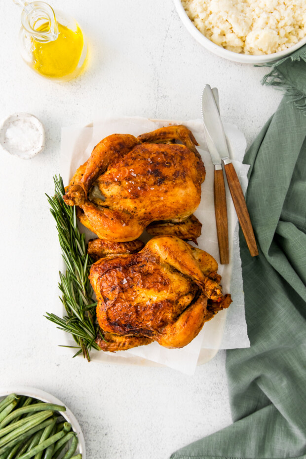 Roasted Cornish Hens served on a table. 