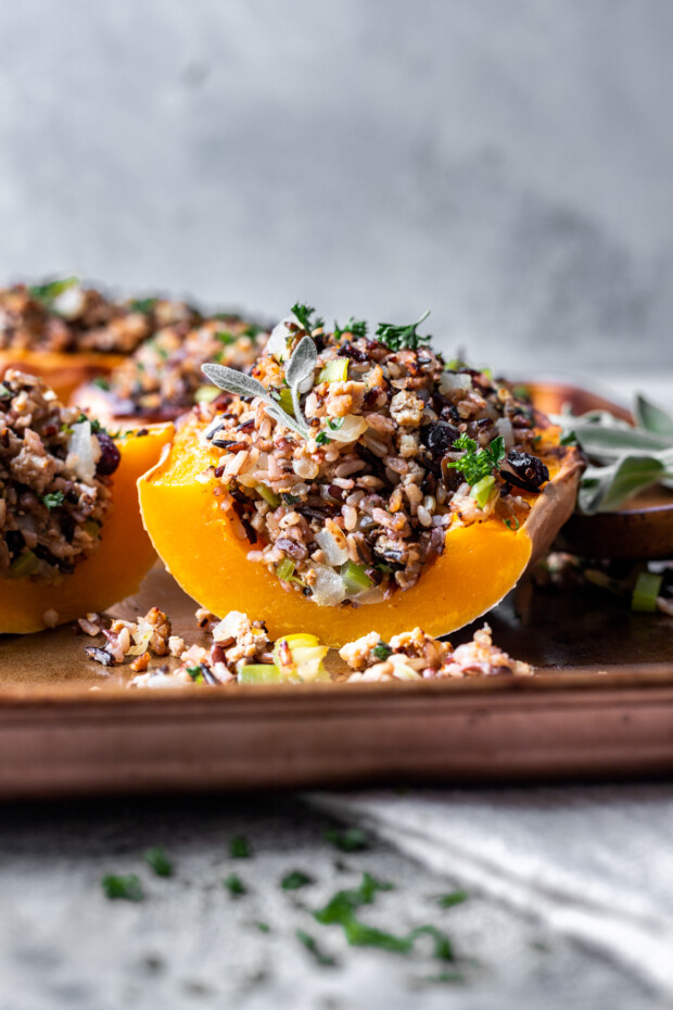 Sliced Stuffed Butternut Squash on a plate. 