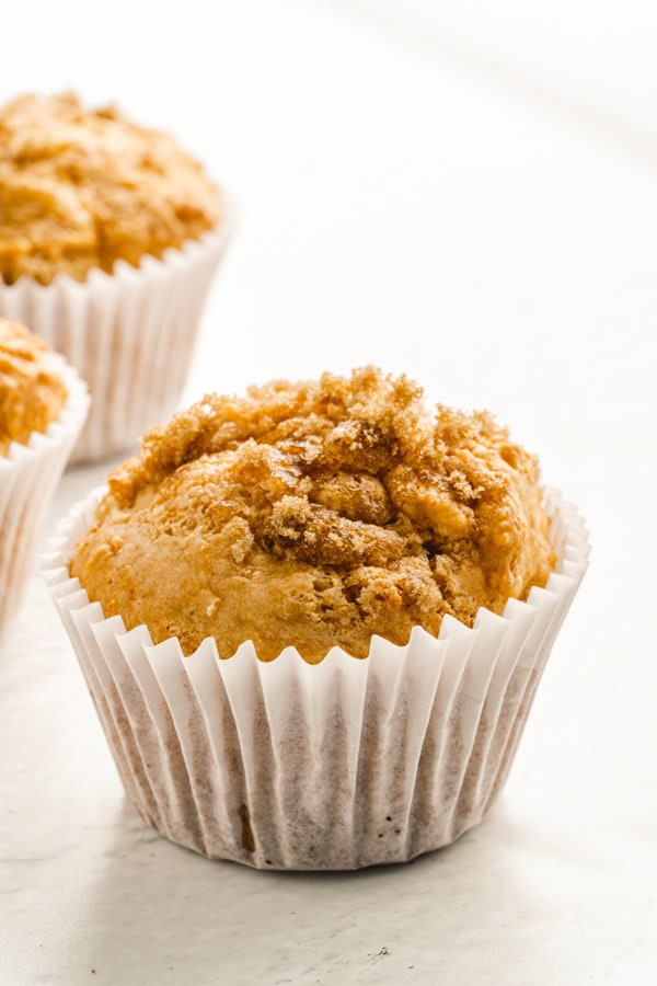 Sweet Potato Muffins in a white muffin liner. 