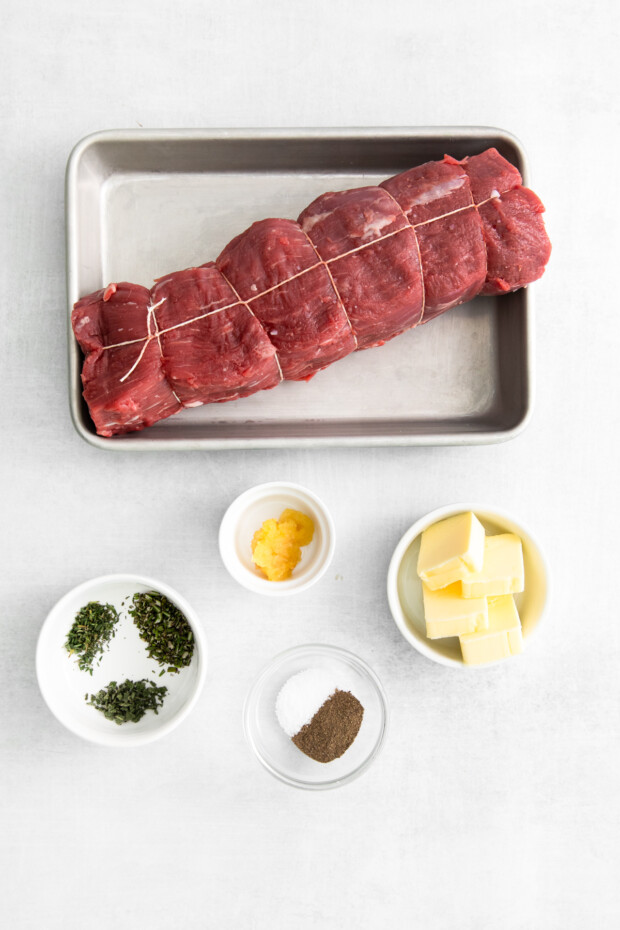 Air Fryer Beef Tenderloin ingredients on a sheet pan. 