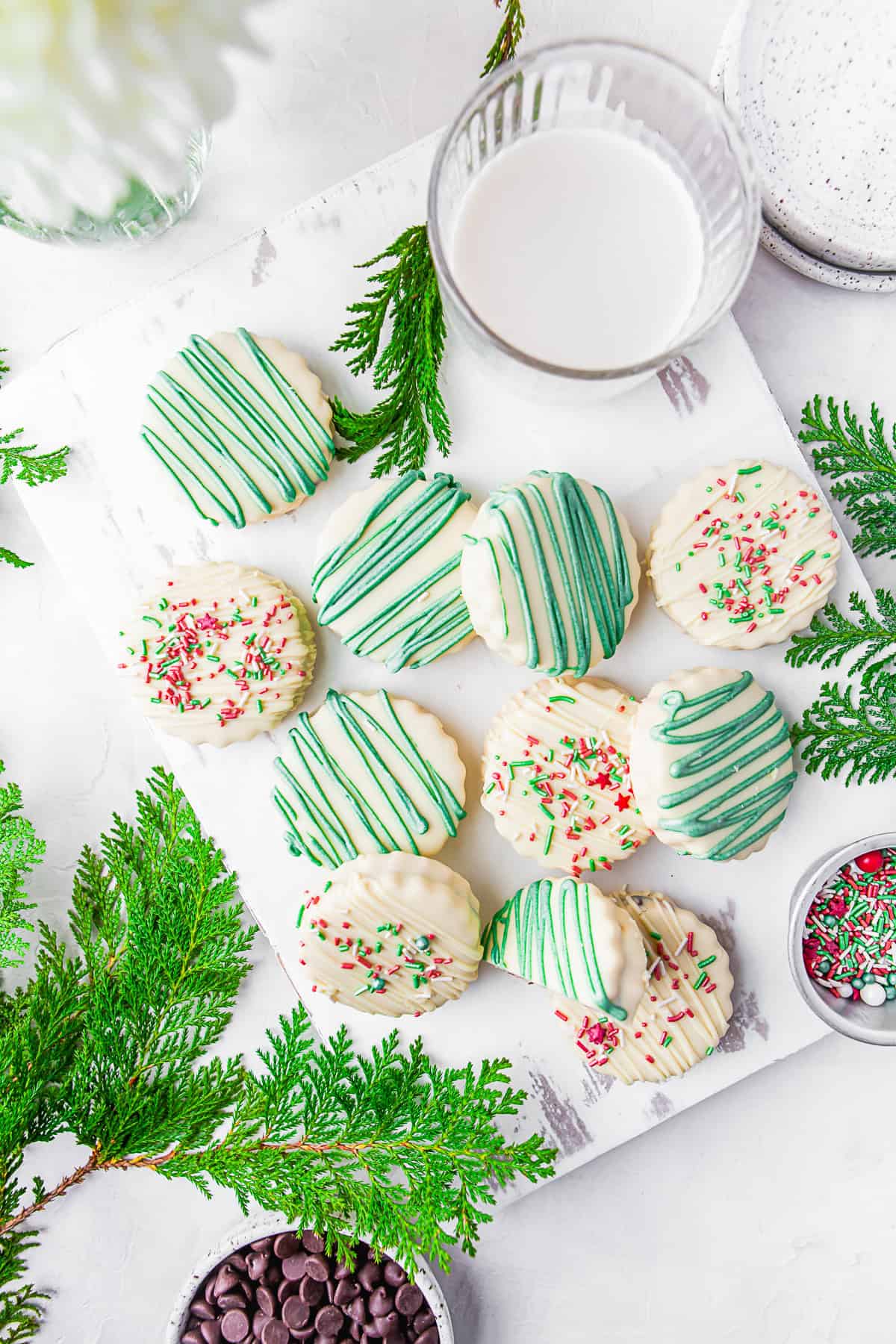 Chocolate Stuffed Shortbread Cookies sitting on a wooden board. 