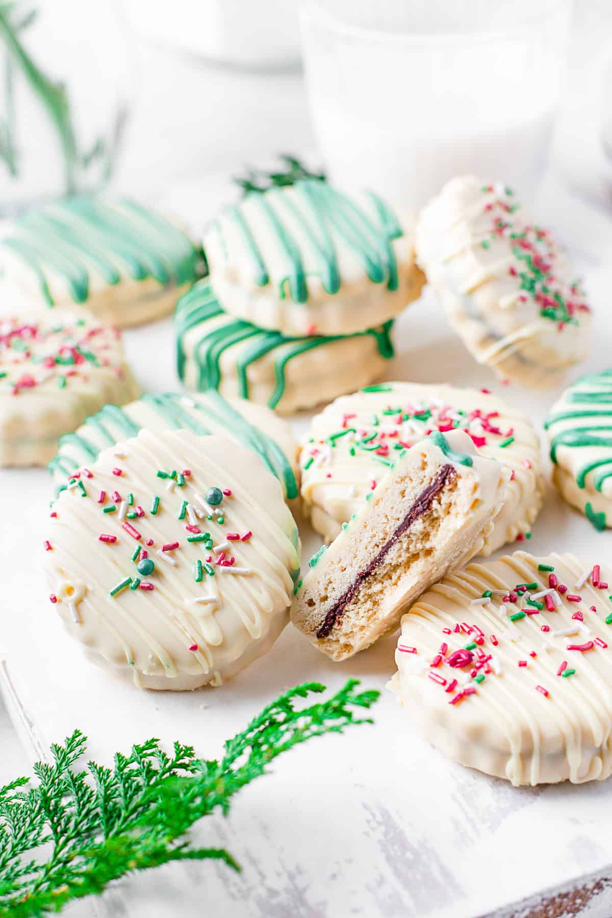 Chocolate Stuffed Shortbread Cookies cut in half to show chocolate filling. 