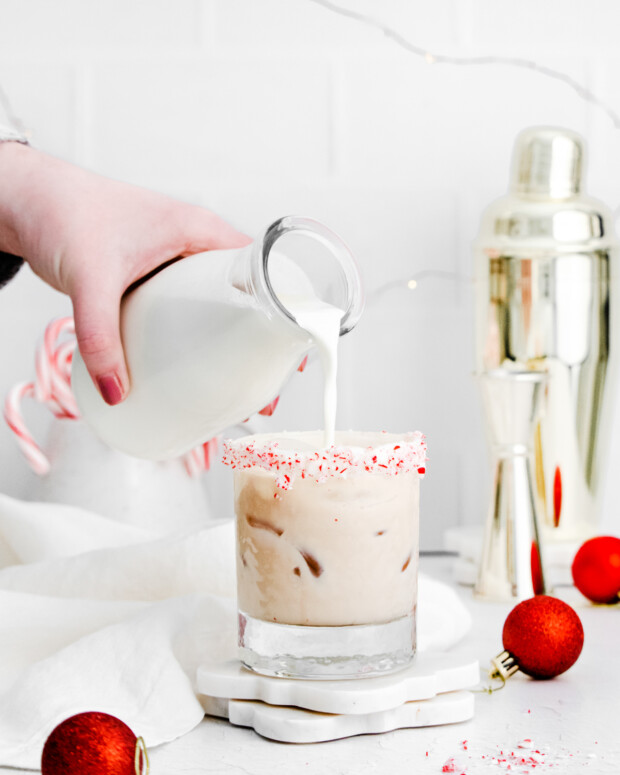 Topping a Peppermint White Russian with half and half. 