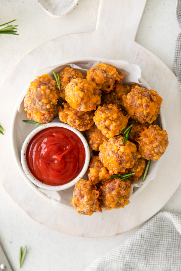 Sausage Cheese Balls sprinkled with fresh herbs. 