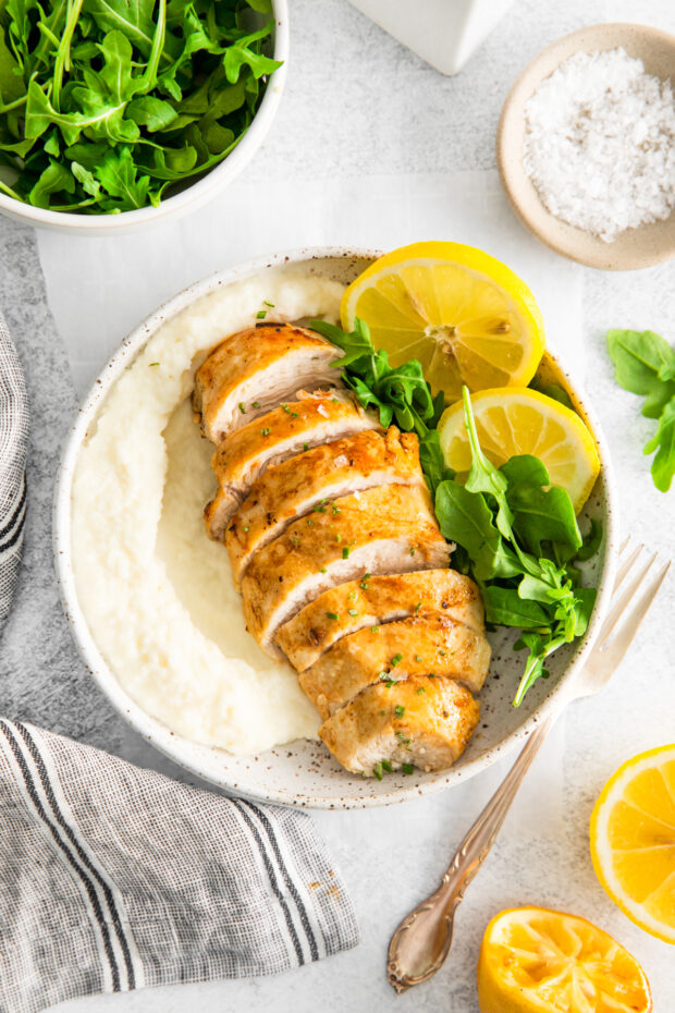 Air Fryer Lemon Chicken served with mashed potatoes. 