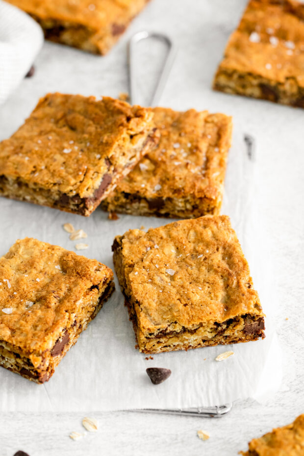 Chocolate Chunk Oatmeal Cookie Bars sliced on a table. 